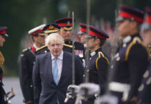 British Prime Minister Inspects Troops as Military Band Plays Imperial March